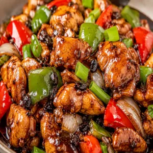 Tender Chicken with black bean sauce (Poulet à la sauce de fève noire) stir-fried with peppers at Harmonie Orientale, LaSalle, Montreal.