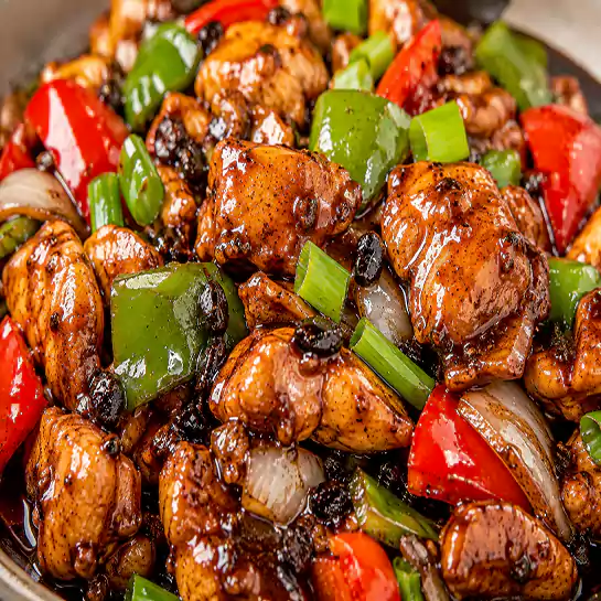 Tender Chicken with black bean sauce (Poulet à la sauce de fève noire) stir-fried with peppers at Harmonie Orientale, LaSalle, Montreal.