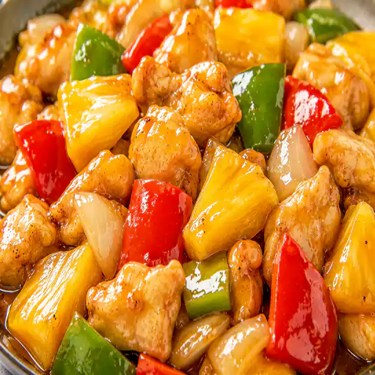 Delicious Chicken with pineapple (Poulet aux ananas) cooked with fresh bell peppers at Harmonie Orientale, LaSalle, Montreal.
