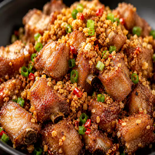 Crispy Golden Dried garlic spareribs (Côtes levées à l’ail) topped with fried minced garlic at Harmonie Orientale, LaSalle, Montreal.