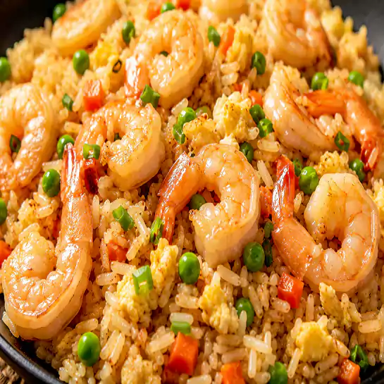 Savory Fried rice with shrimps (Riz frit aux crevettes) mixed with fresh vegetables at Harmonie Orientale, LaSalle, Montreal.