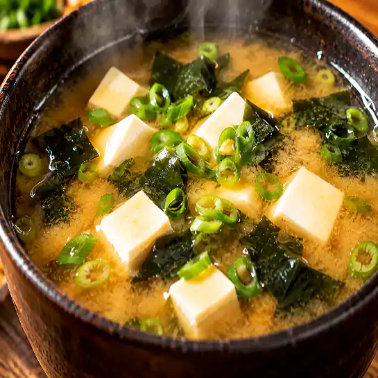 Traditional Miso Soup (Soupe Miso) with silky tofu and fresh green scallions at Harmonie Orientale, LaSalle, Montreal.