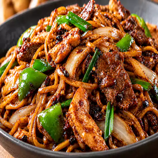 Savory Noodles with black bean sauce (Nouilles à la sauce aux fèves noires) with chicken and beef at Harmonie Orientale, LaSalle, Montreal.